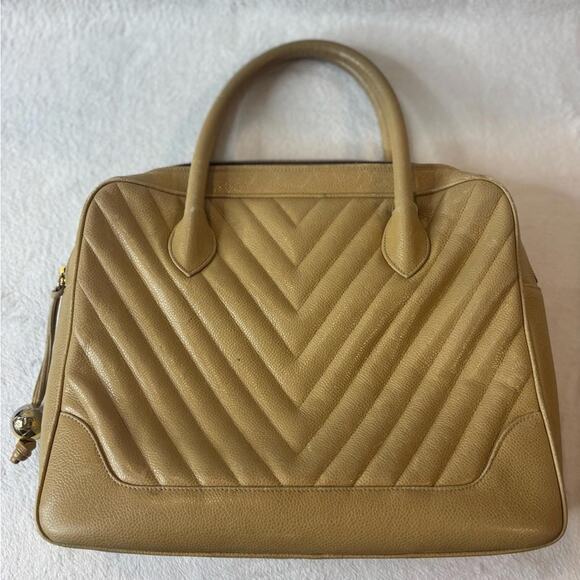 CHANEL Handbags - Chanel caviar skin v stitch handbag